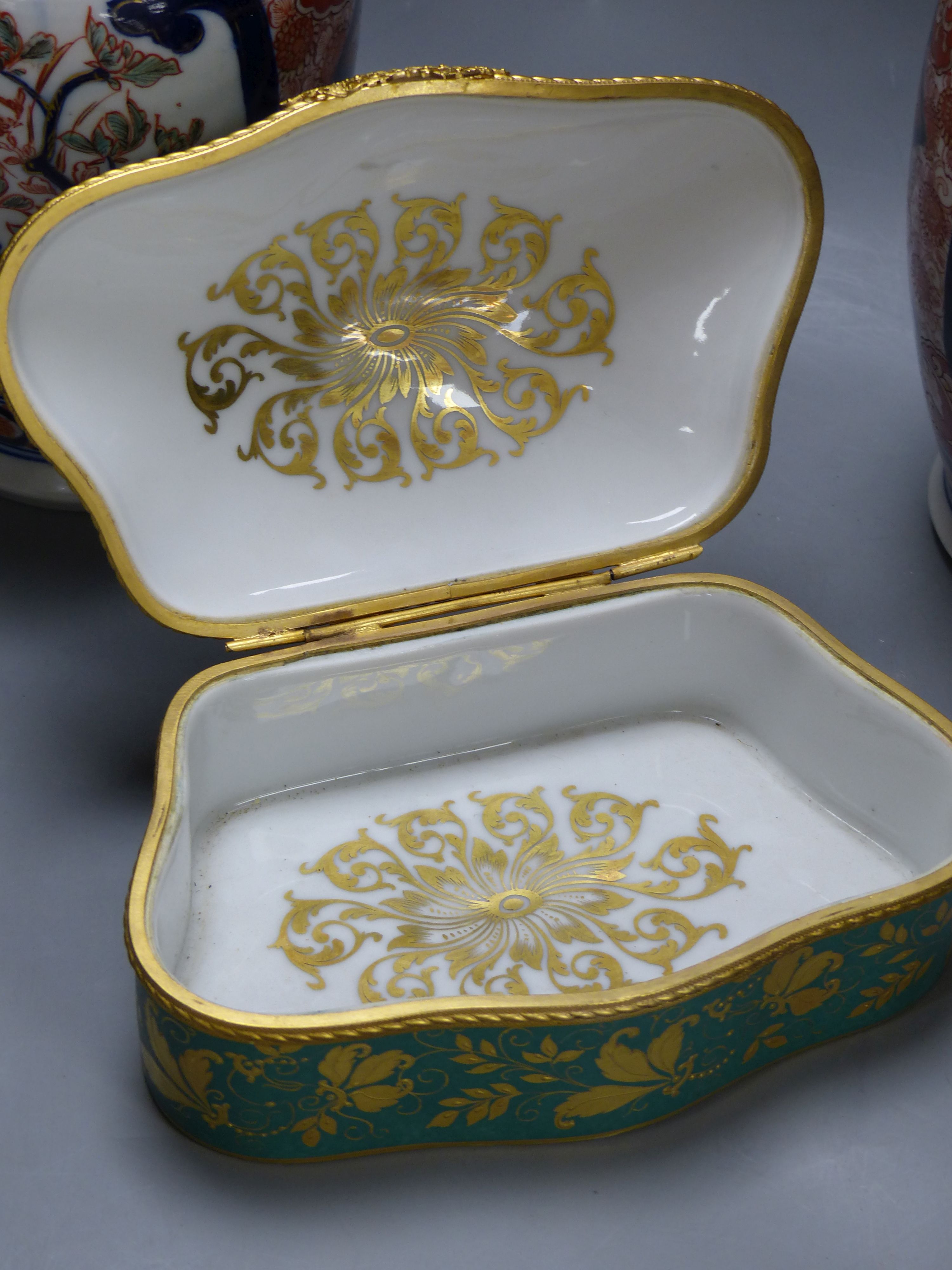 A pair of Imari vases and covers and a Limoges box, height 30cm